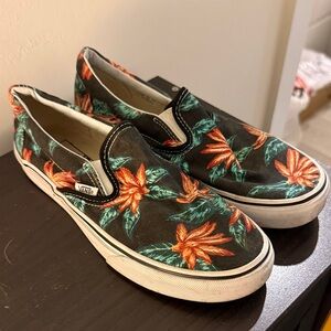 Vans Black Slip-On Sneakers with Orange Floral and Green Leaves